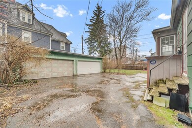 Driveway with 4 car garage!