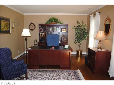 Living Room - Currently used as an office, the liv