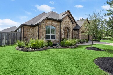 The greenery accents the home gracefully!