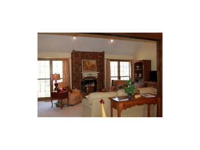 Large, open Family room w/FP flanked by floor-to c