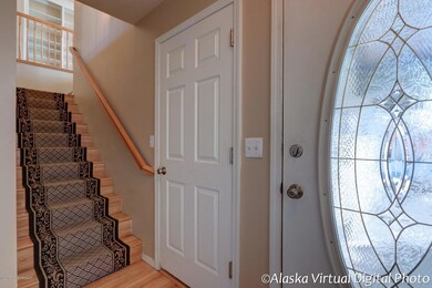 Entryway & door into Garage.