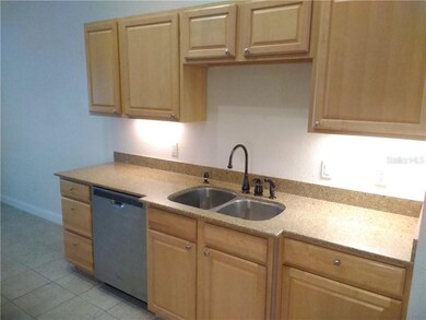 KITCHEN WITH UNDERMOUNT SINK AND NEWER FAUCETS