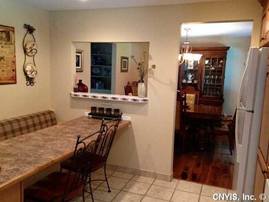 Kitchen. Great eating area with storage in bench and perfect table for buffets.