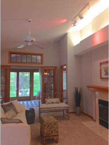 Vaulted ceilings, patio access, sunroom and firepl