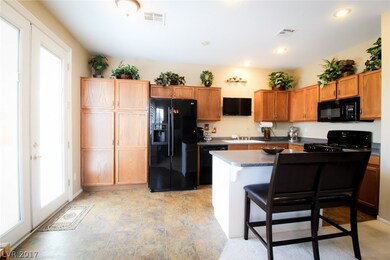 Spacious kitchen with island.  Cabinets in island
