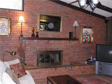 Great room fireplace with 20 ft. brick hearth, gas