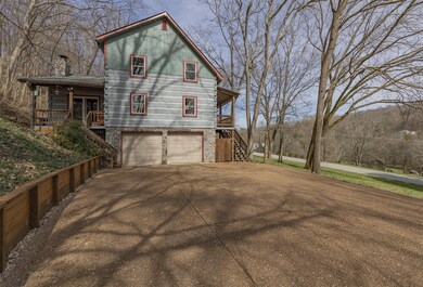 2 oversized two car garage has extra unfinished basement space. Plenty of room on the driveway pad for extra cars.