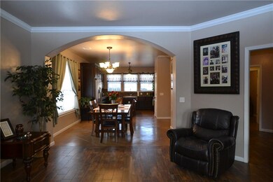 Tons of natural light throughout living, dining an