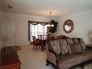 Open floorplan w/front dining area open to cozy li