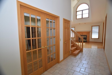 The front entry has easy access to the homes formal dining room, main floor office, Living room and the kitchen spaces.