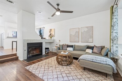 Step down into the living room & nestle around a warm fire on those chilly TX nights.