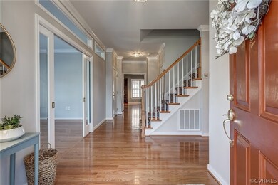 You'll be greeted by a welcoming foyer, complete w