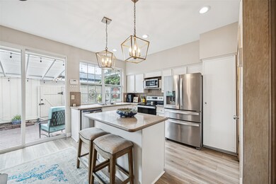 Island kitchen is complete with 2019 appliances an