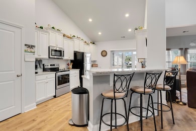 Kitchen with appliances with stainless steel finis