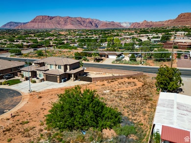 Aerial view of residential area with a mountainous background