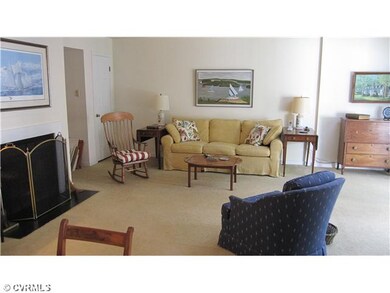 Living Room - Includes wood burning fireplace and 