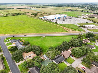 1.6 acre lot off West Loop (FM 2765)