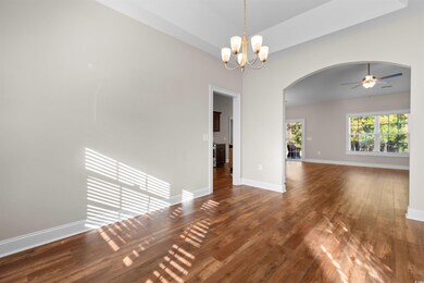 Spare room with hardwood / wood-style flooring and