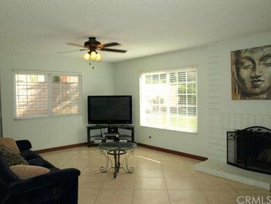 Family Room with Fireplace and Fan