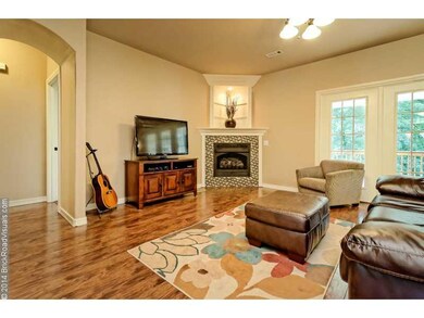 Living Room. The beautiful fireplace with built in display shelves is the focal point of the Living Room!