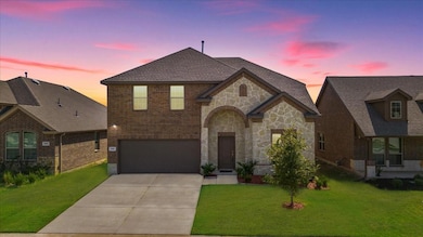 View of front of home with a yard