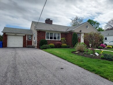 Left Front w/Garage & Expanded Driveway