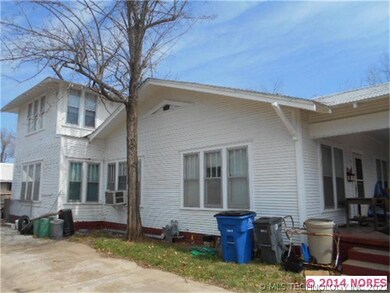 Includes Two Car Detached Garage w/ Workshop.