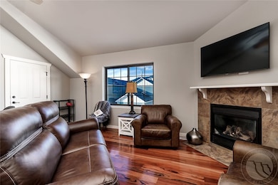 LIVINGROOM WITH VEIW AND FIREPLACE