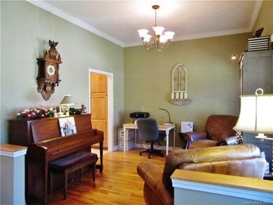 Formal dining room with hardwoods