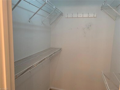 Walk in closet in main bedroom