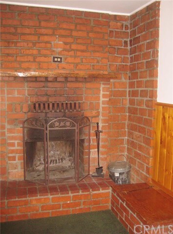 Cozy brick fireplace