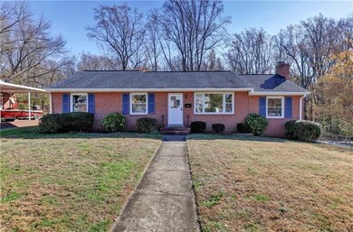 Lovely Brick Rancher on large, private, corner lot