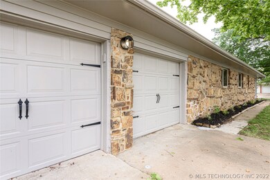 Large 2 car garage with side entry
