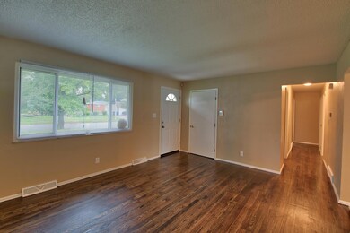 front room inside corner by kitchen