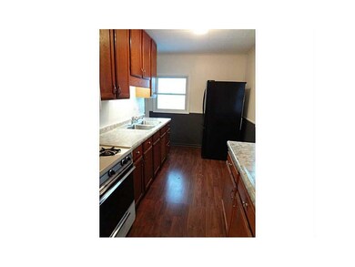 . Kitchen with laminate flooring