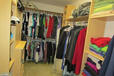 Walk-in Closet w Built-in Shelving