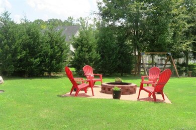 THE LANDSCAPED PRIVATE BACK YARD IS FENCED AND HAS