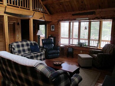 Living Room. The large bow window...