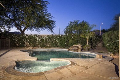 Sparkling Pool and Spa with Waterfall