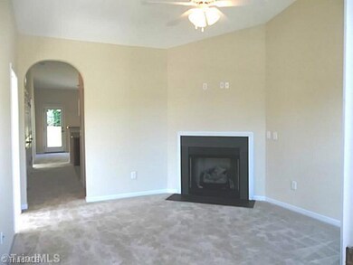 Den/Family/Great Room. Large, front great room has a dramatic cathedral ceiling, ventless gas log fireplace, ceiling fan and lots of natural light.