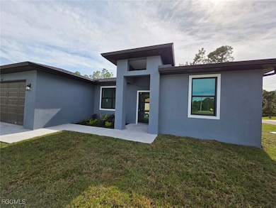 1507 W 11th St, Lehigh Acres, FL 33972 - photo 2