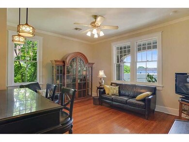 Living Room. High ceilings, wood floors, bright su