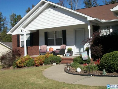 Notice this cozy front porch.  Come on in and make yourself at home!