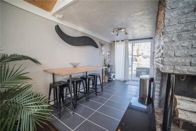 Dining area and glass doors to the back yard.
