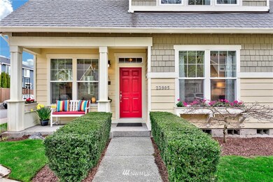 Inviting front porch! Cement plank siding, wood shingles, very attractive inside and out!