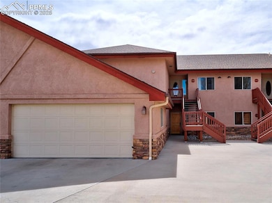 Detached garage (left).
