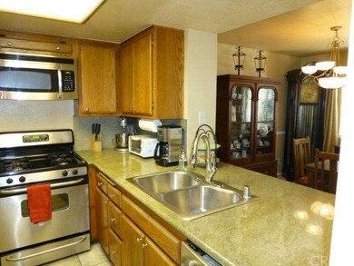 Kitchen has Lovely Granite Counter Tops, Stainless