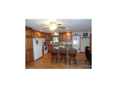 Open kit custom oak cabinets