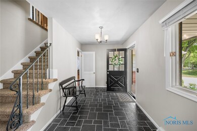 Spacious , light-filled front entry is 15 feet lon