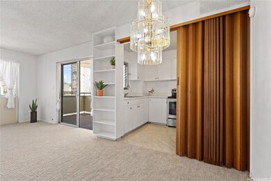 Kitchen has windows. The accordion door can separate the living room and kitchen